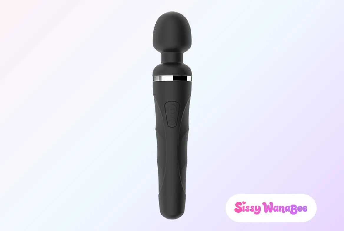 Studio product shot of the Lovense Domi 2 mini wand in matte black silicone standing upright against a soft pink and lavender gradient, its rounded head above a slim chrome band, the ridged handle carrying the two control buttons, the quiet authority of an instrument kept within reach
